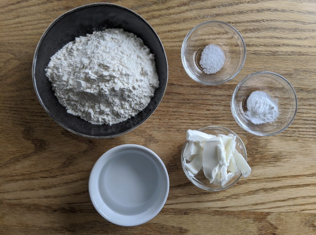 Overhead shot of five ingredients for homemade flour camping tortilla recipe